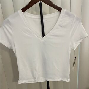 No Boundaries White V-Neck Crop Rib Tee. Vivid White color.